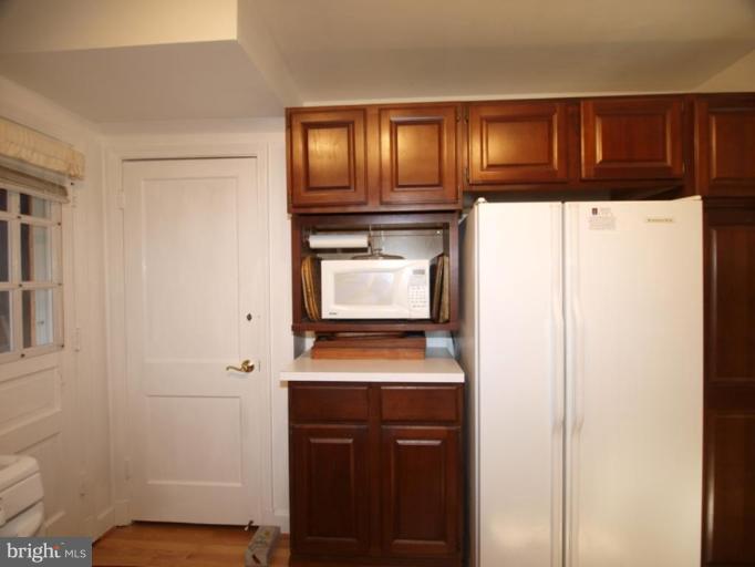 2600 Dawson Avenue Silver Spring, MD 20902 - Photo 17 of 24 a view of an entryway with wooden floor