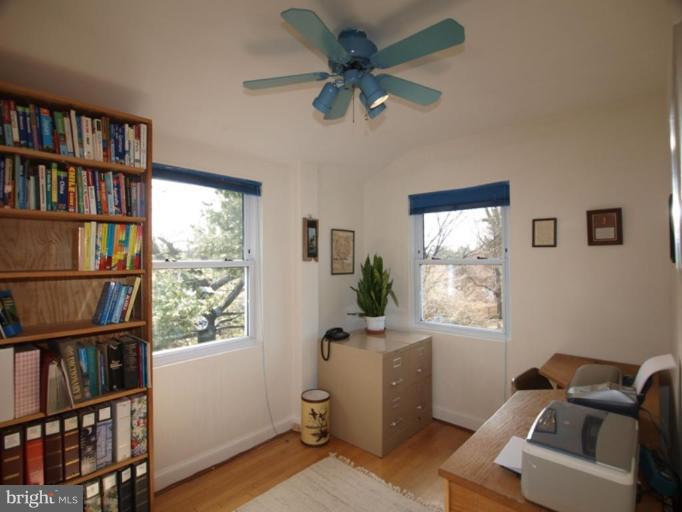 2600 Dawson Avenue Silver Spring, MD 20902 - Photo 19 of 24 a room with furniture book shelf and a window