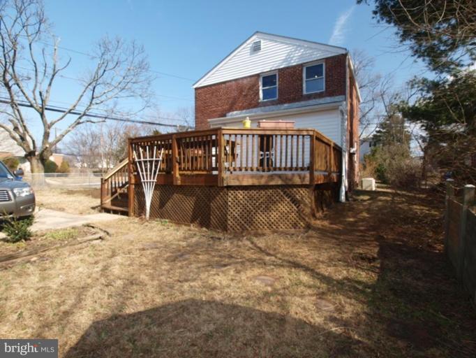 2600 Dawson Avenue Silver Spring, MD 20902 - Photo 22 of 24 a view of a house with large wooden fence