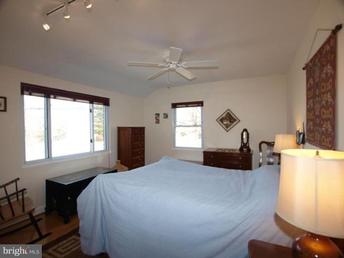 2600 Dawson Avenue Silver Spring, MD 20902 - Photo 8 of 24 a bedroom with a bed and a window