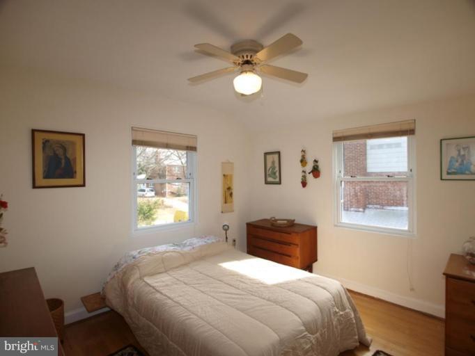 2600 Dawson Avenue Silver Spring, MD 20902 - Photo 9 of 24 a bedroom with a bed and a window