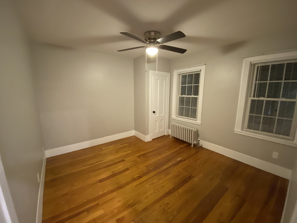 91 Main, Unit 2W Easton, MA 02356 - Photo 7 of 8 a view of an empty room with a window