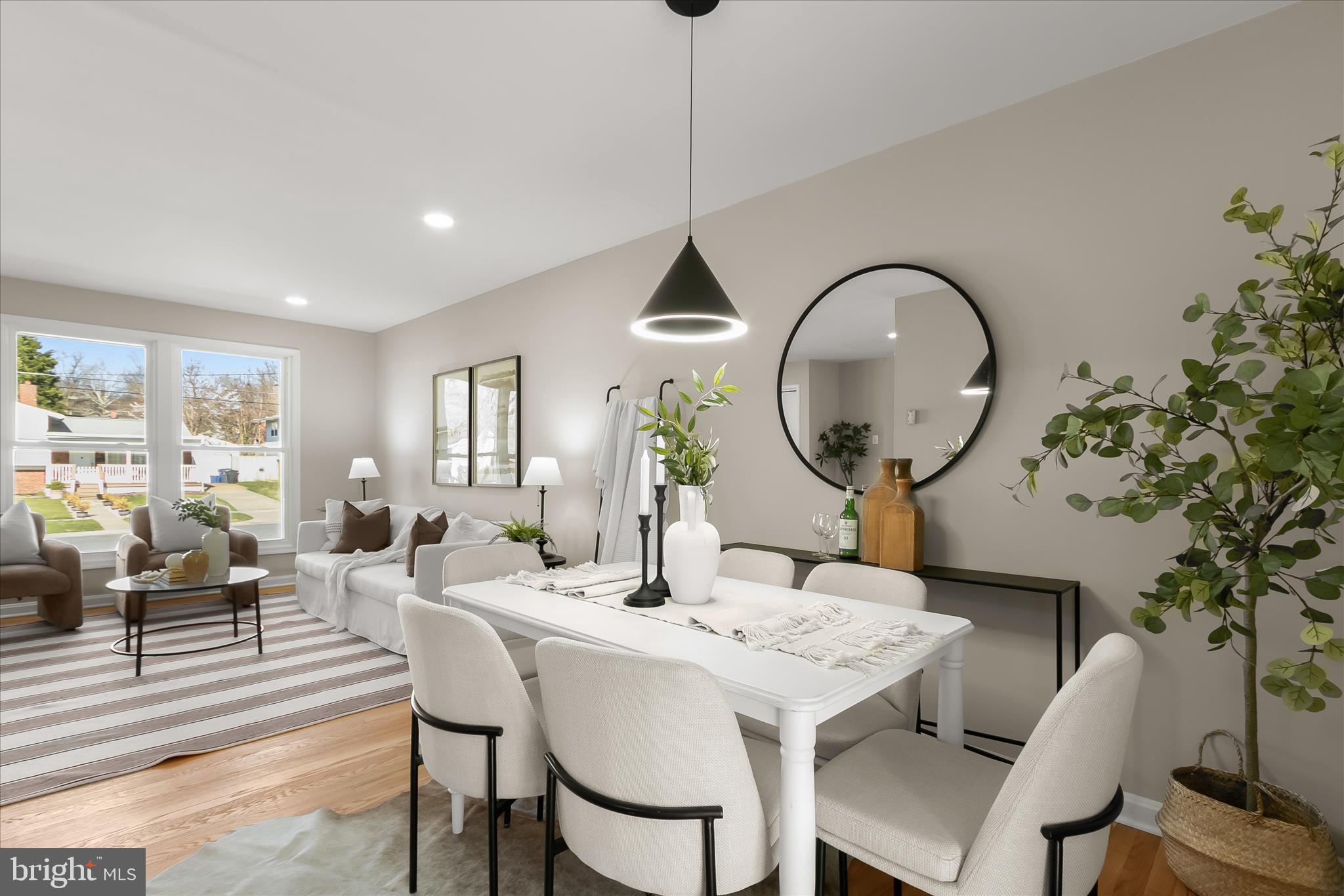 13218 Holdridge Road Silver Spring, MD 20906 - Photo 9 of 51 a view of a dining room with furniture and wooden floor