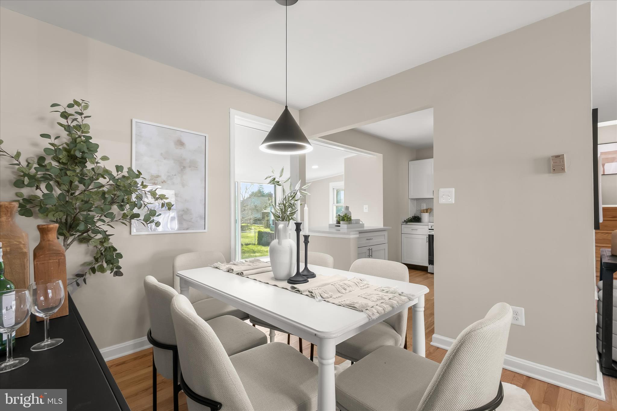 13218 Holdridge Road Silver Spring, MD 20906 - Photo 11 of 51 a view of a dining room with furniture window and wooden floor