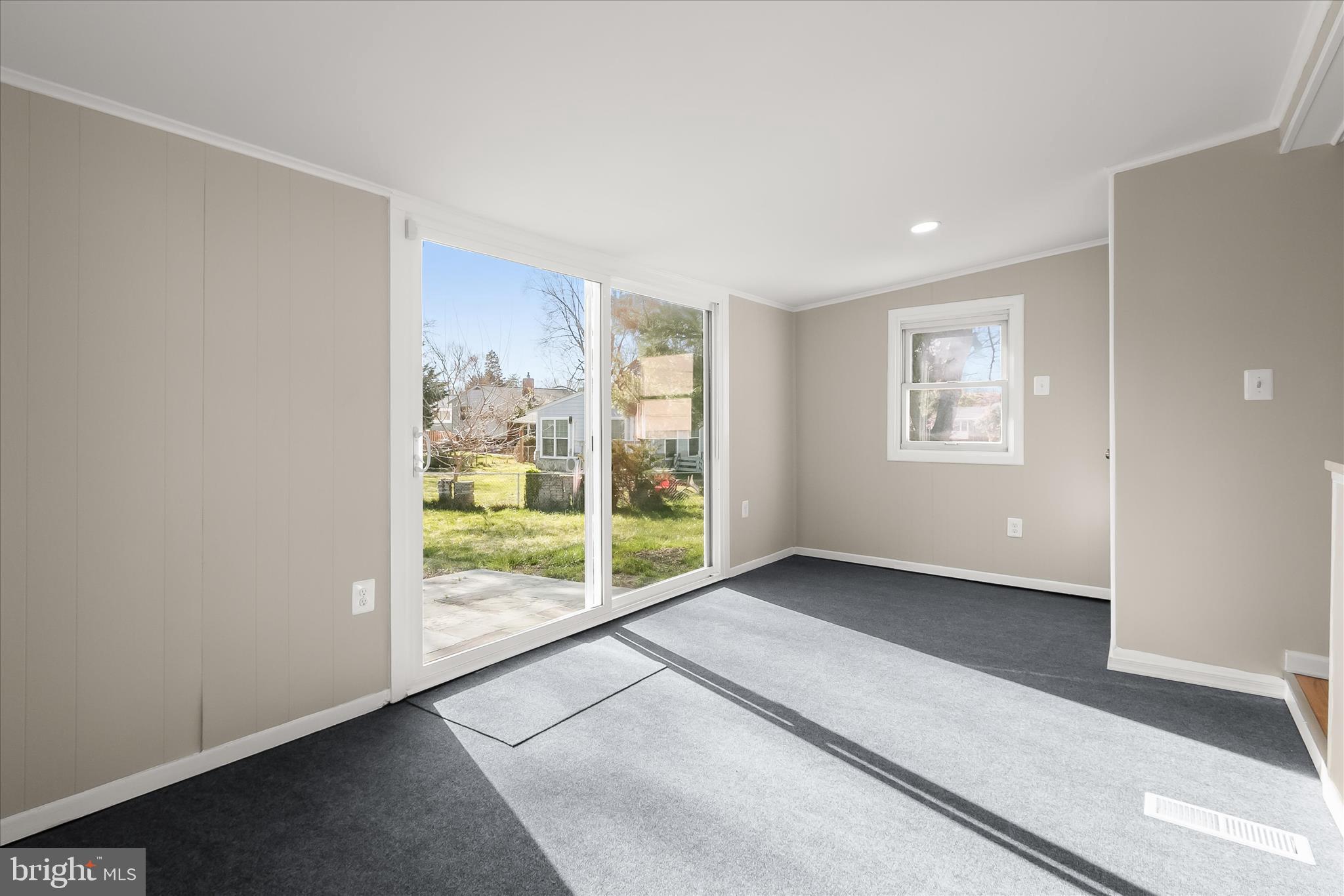 13218 Holdridge Road Silver Spring, MD 20906 - Photo 18 of 51 an empty room with windows