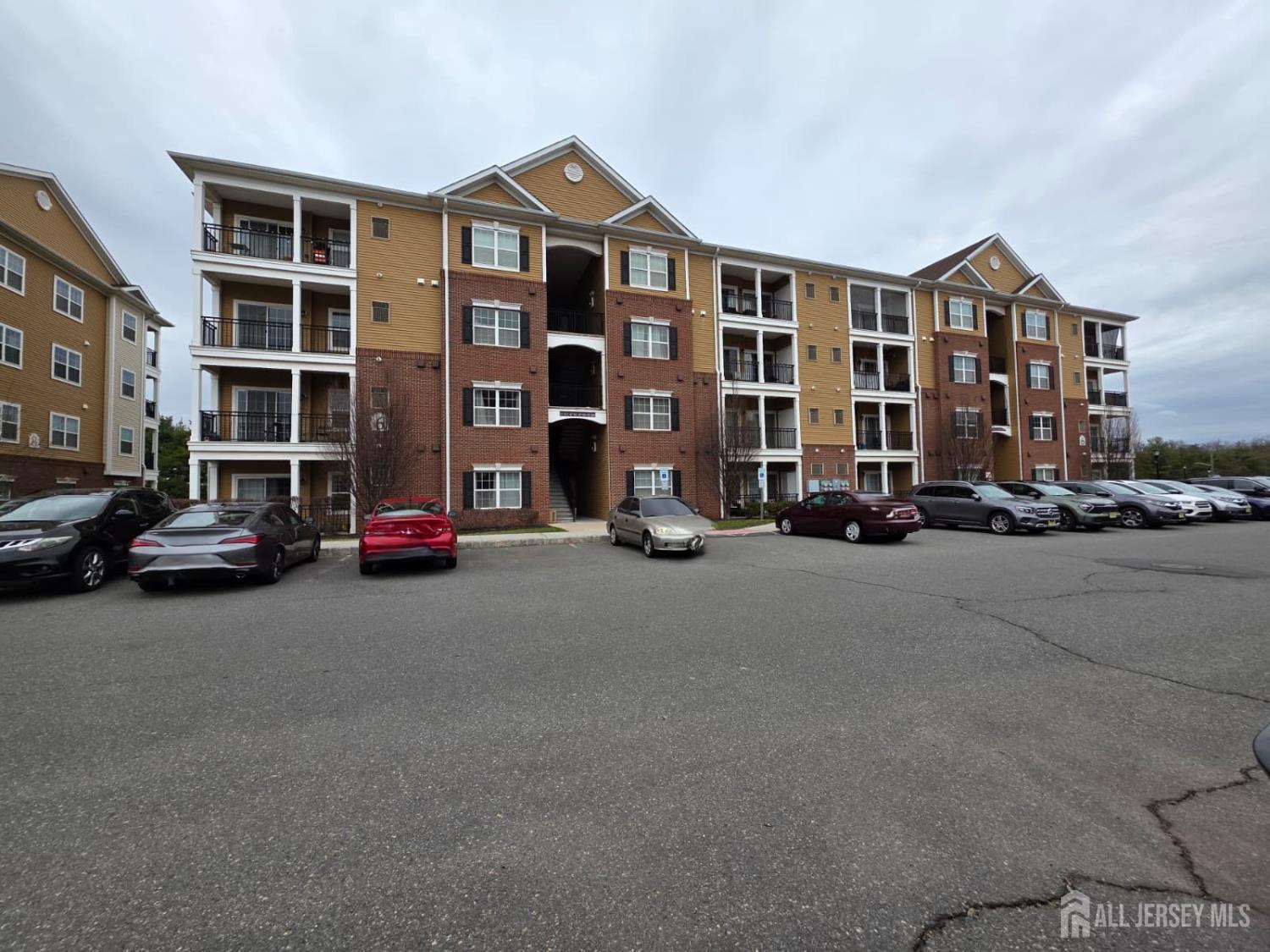 631 Strassle Way South Plainfield, NJ 07080 - Photo 1 of 34 a view of a street with a cars