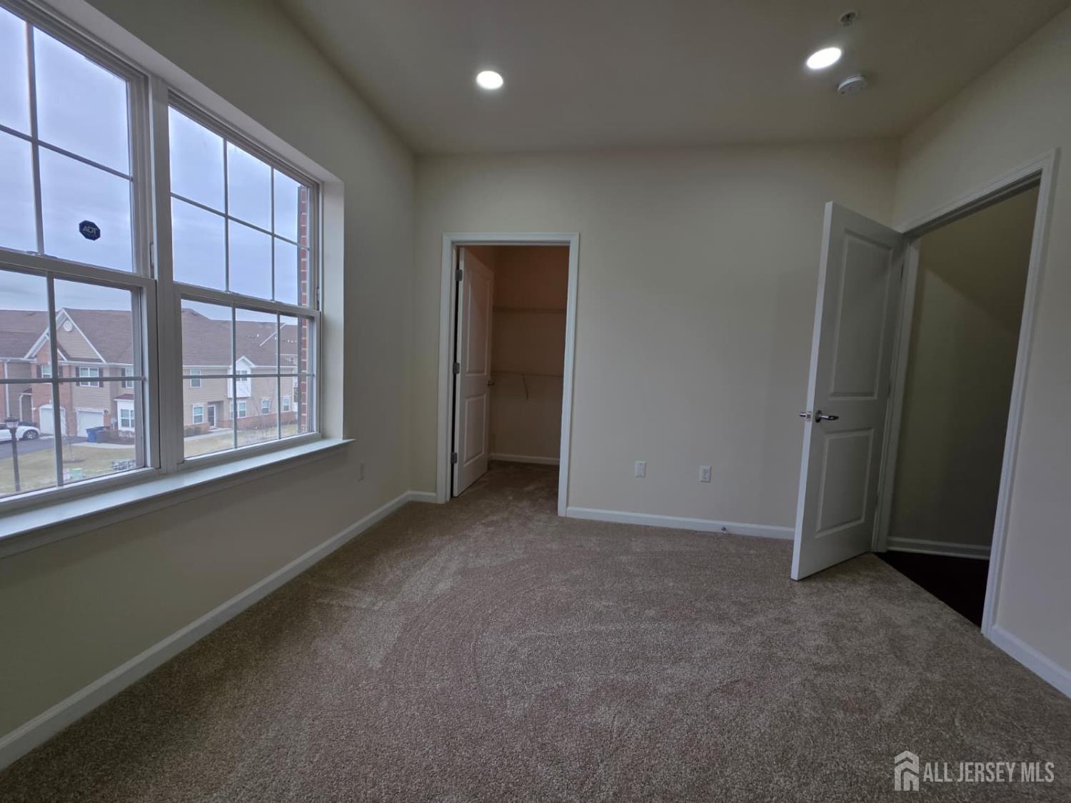 631 Strassle Way South Plainfield, NJ 07080 - Photo 12 of 34 an empty room with windows