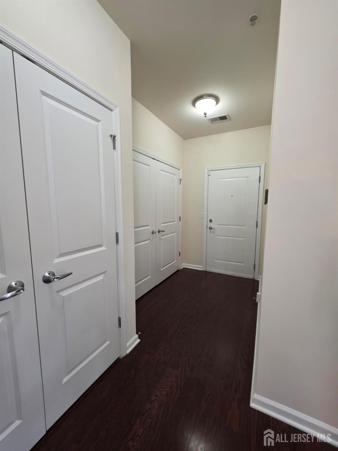 631 Strassle Way South Plainfield, NJ 07080 - Photo 13 of 34 wooden floor in an empty room