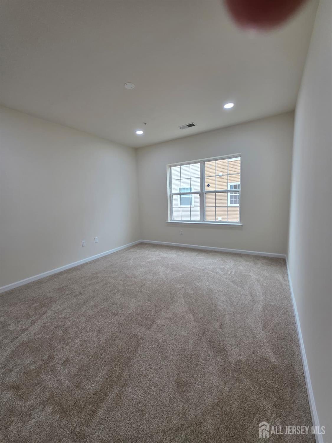 631 Strassle Way South Plainfield, NJ 07080 - Photo 14 of 34 an empty room with windows