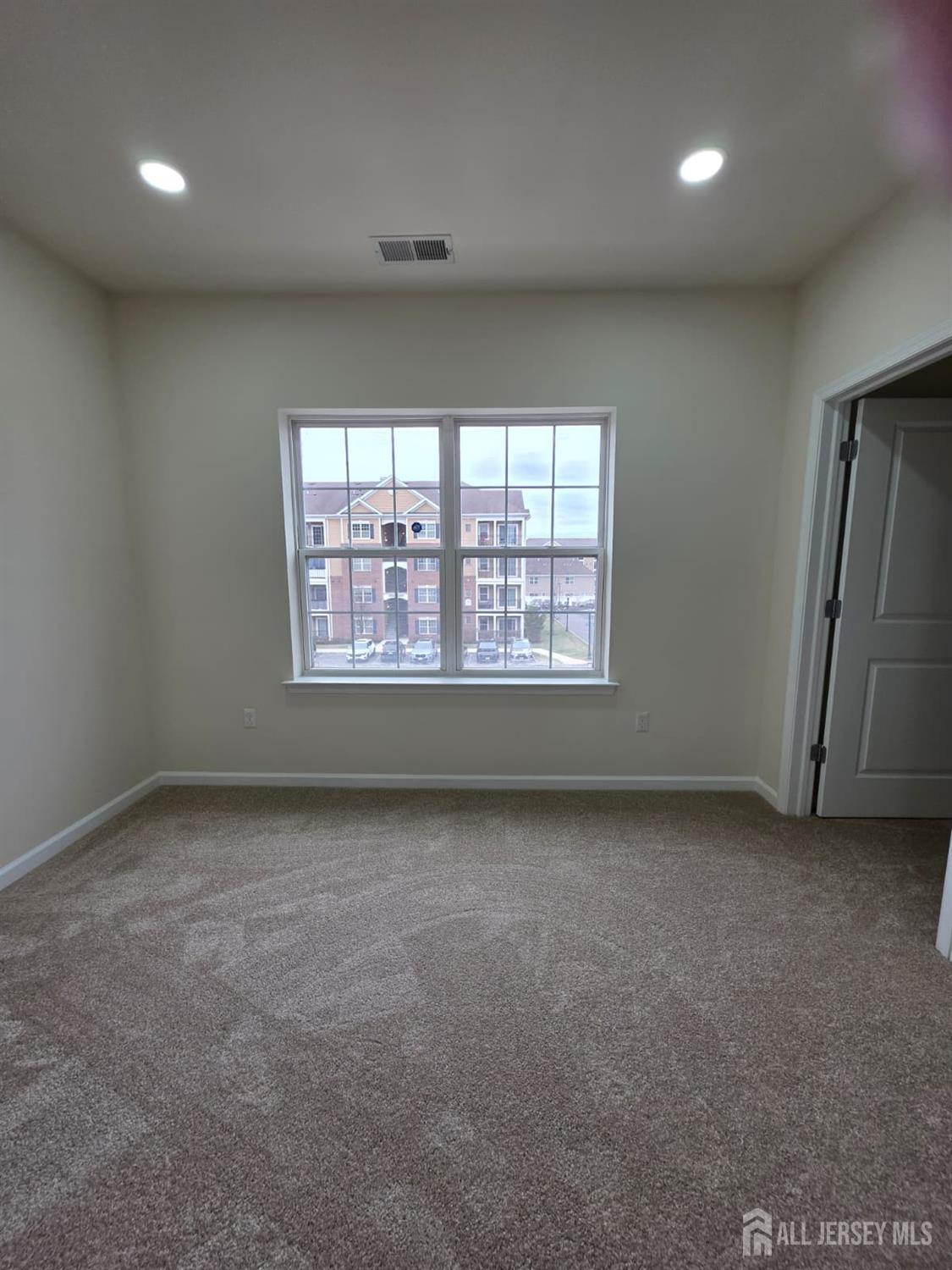 631 Strassle Way South Plainfield, NJ 07080 - Photo 15 of 34 an empty room with a window