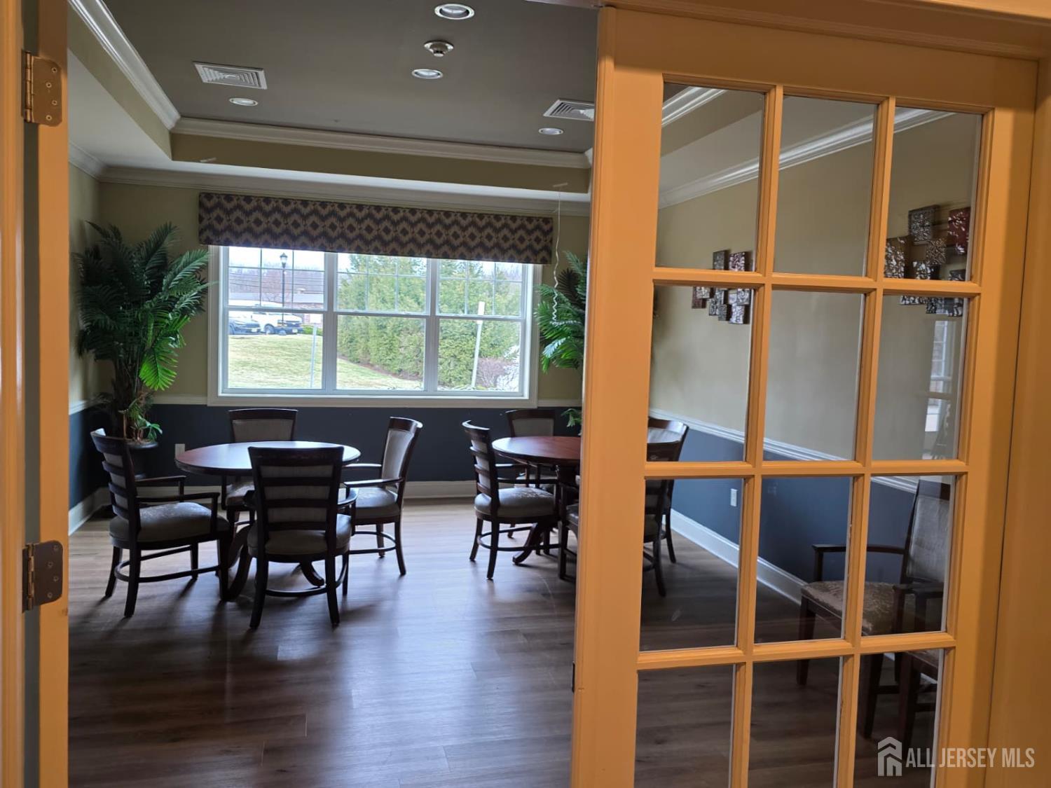631 Strassle Way South Plainfield, NJ 07080 - Photo 23 of 34 a view of a dining room with furniture and wooden floor