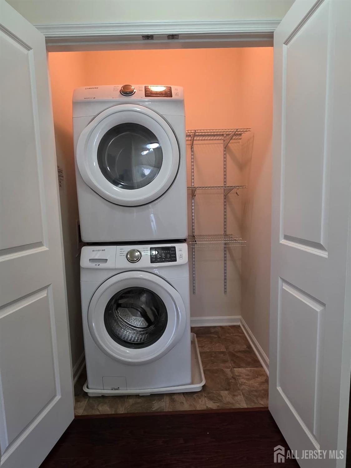 631 Strassle Way South Plainfield, NJ 07080 - Photo 30 of 34 a utility room with dryer and washer