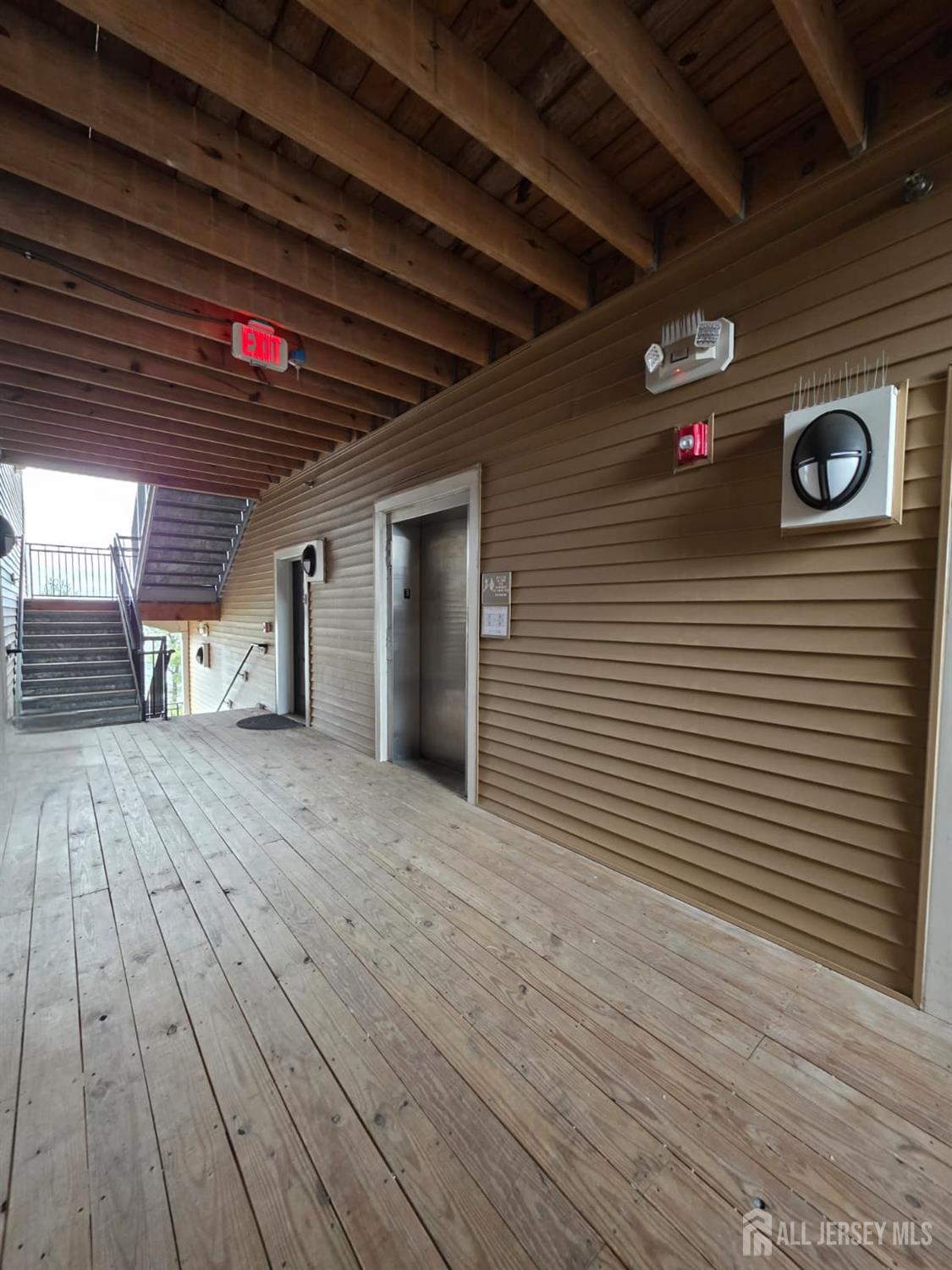 631 Strassle Way South Plainfield, NJ 07080 - Photo 32 of 34 a view of a hallway with wooden floor