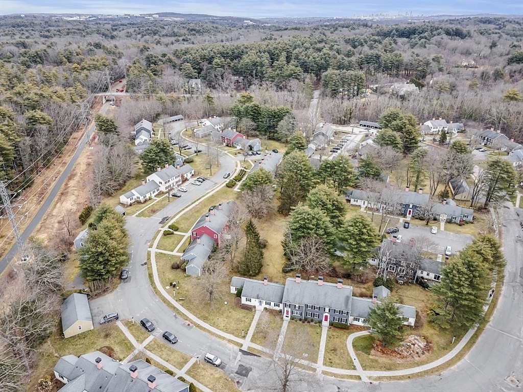 64 Jericho Road, Unit 64 Weston, MA 02493 - Photo 26 of 26 an aerial view of a house with a swimming pool