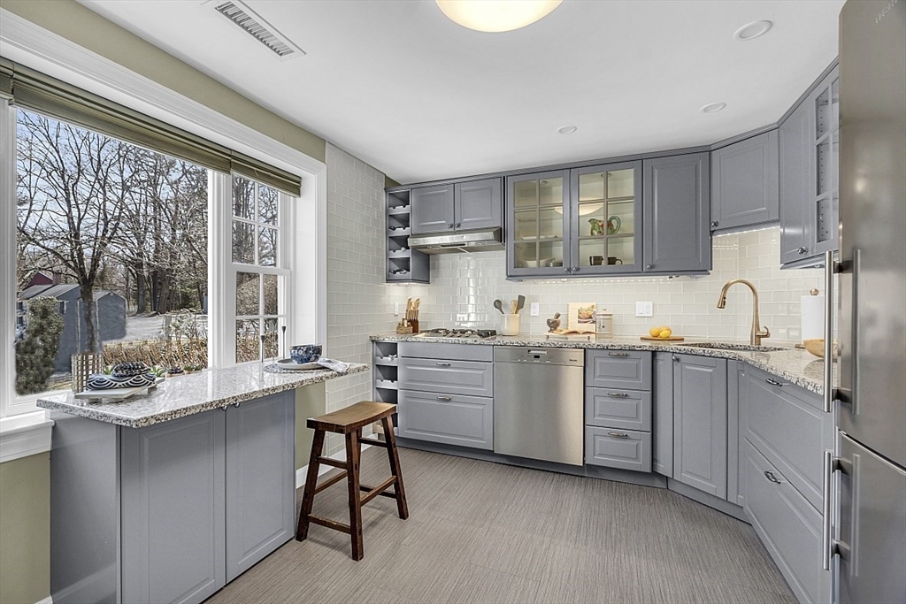 64 Jericho Road, Unit 64 Weston, MA 02493 - Photo 10 of 26 a kitchen with sink and cabinets