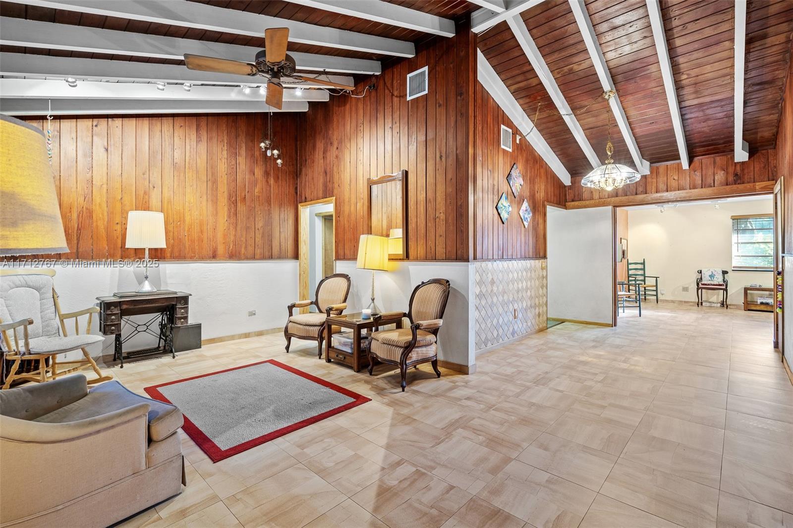 a living room with furniture and a outdoor space