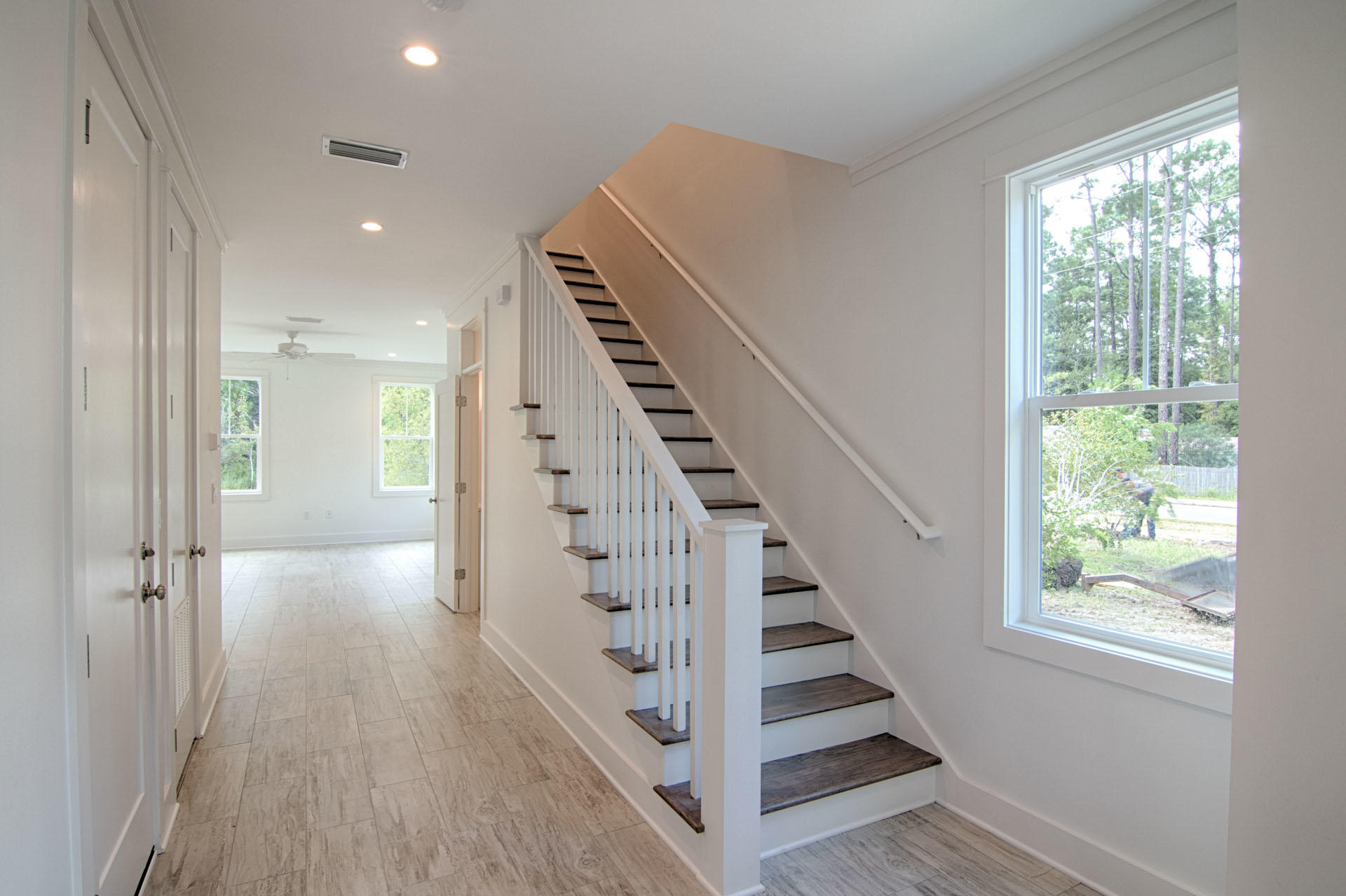 Lot #18 Lighthouse Pointe Boulevard Santa Rosa Beach, FL 32459 - Photo 19 of 27 Stair case and living