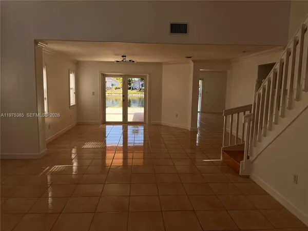 a view of balcony with floor and lake view