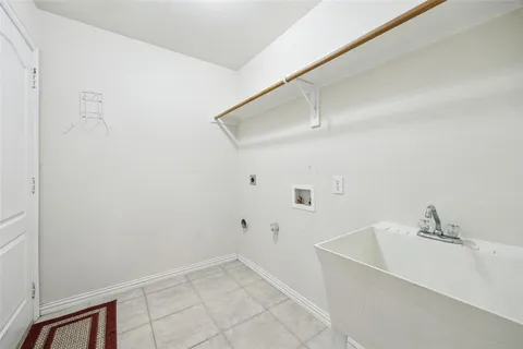 a white bath tub sitting in a bathroom