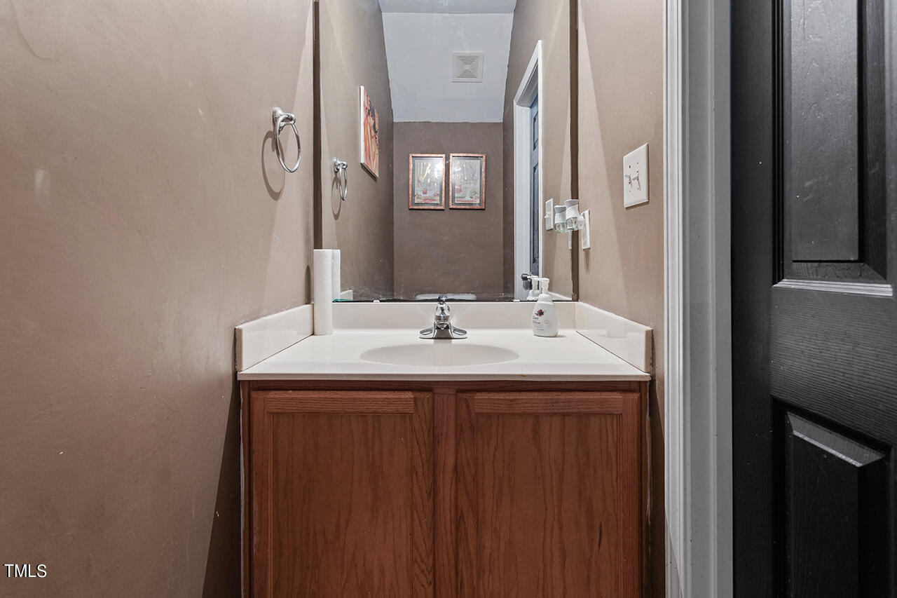 4642 Centrebrook Circle Raleigh, NC 27616 - Photo 12 of 27 Easy guest access on the main level