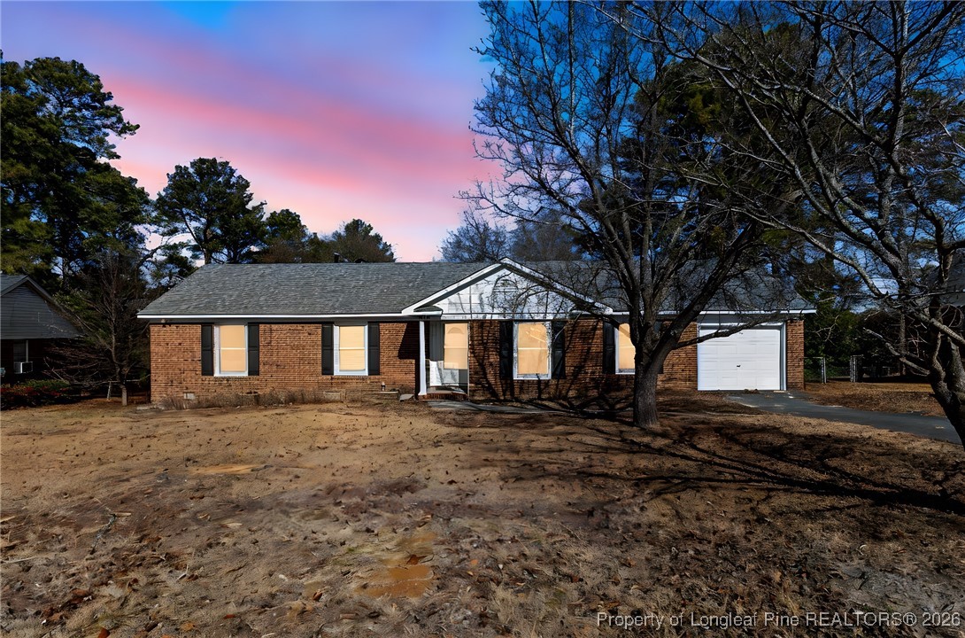 5196 Remington Road Fayetteville, NC 28311 - Photo 1 of 34 a front view of a house with a yard