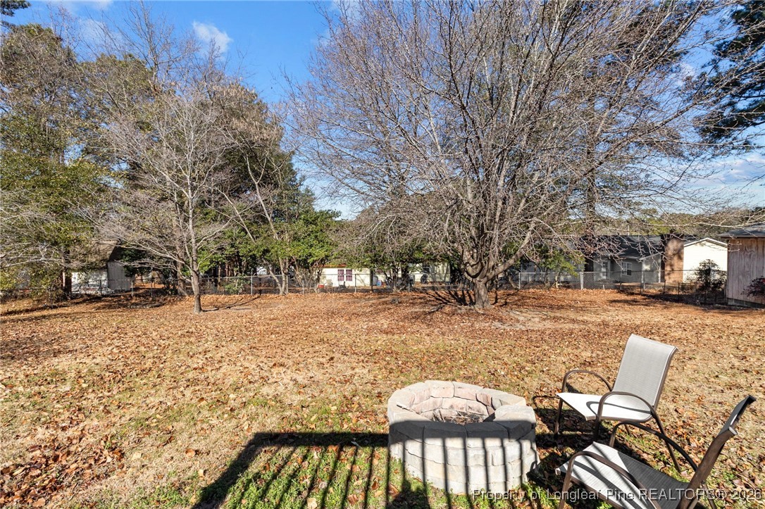 5196 Remington Road Fayetteville, NC 28311 - Photo 29 of 34 a view of a backyard with snow