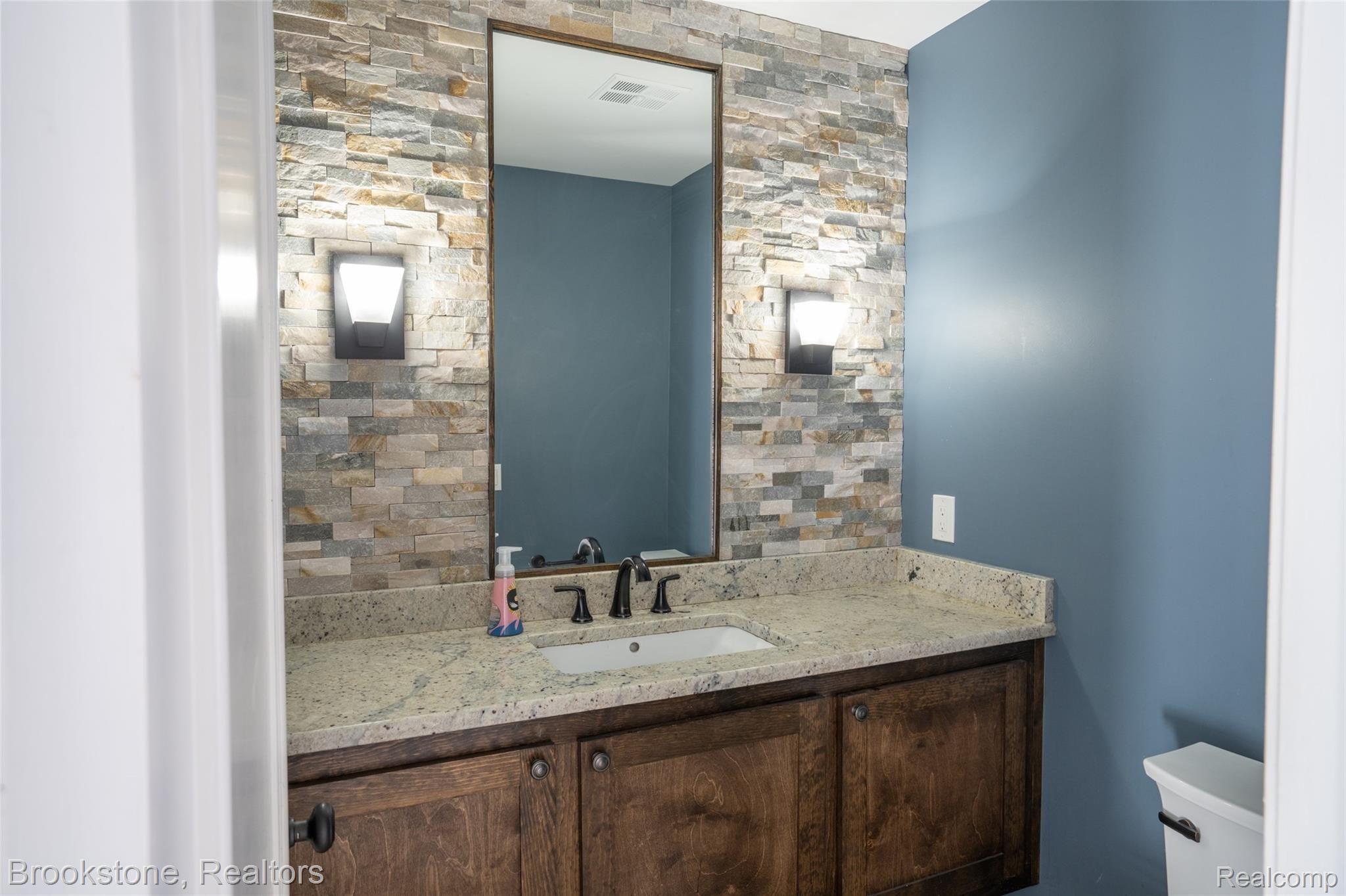 1039 Stony Pointe Boulevard Rochester, MI 48307 - Photo 30 of 61 entry level half bath