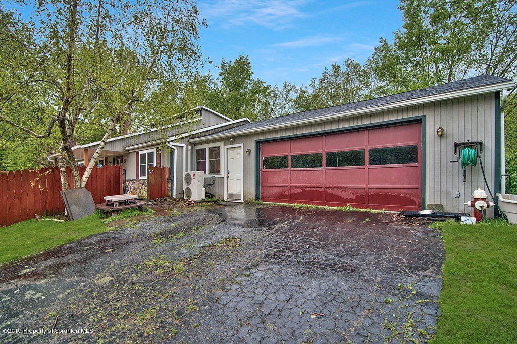 162 Highland Road Dalton, PA 18414 - Photo 2 of 44 a view of a house with backyard and garden
