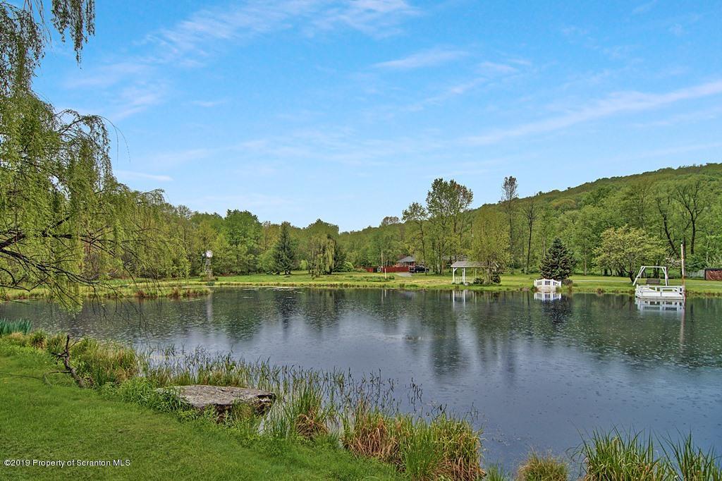 162 Highland Road Dalton, PA 18414 - Photo 26 of 44 a view of a lake with houses in outdoor space