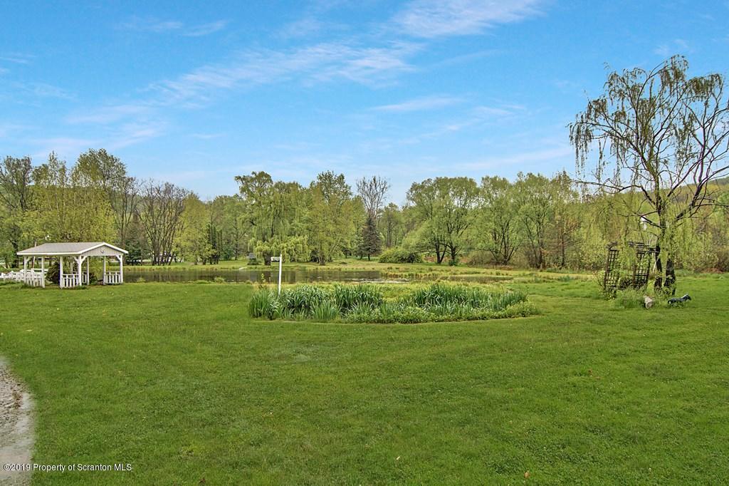 162 Highland Road Dalton, PA 18414 - Photo 29 of 44 a view of a grassy field