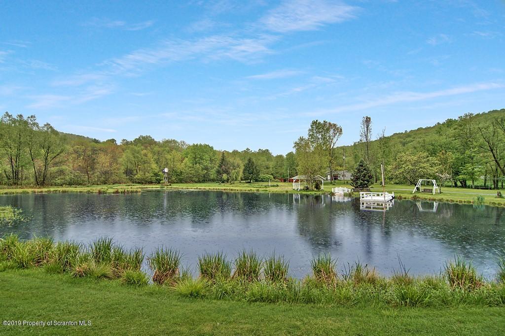 162 Highland Road Dalton, PA 18414 - Photo 3 of 44 a view of a lake with houses in outdoor space