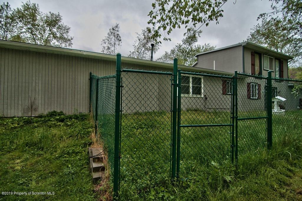 162 Highland Road Dalton, PA 18414 - Photo 35 of 44 a view of backyard of house with green space