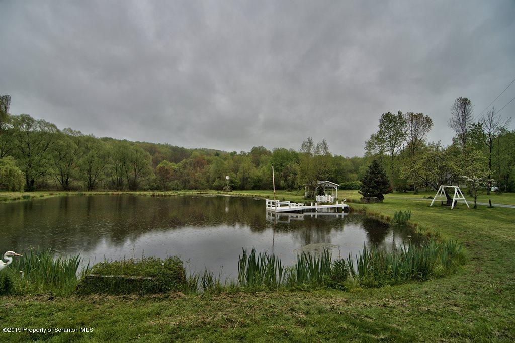 162 Highland Road Dalton, PA 18414 - Photo 39 of 44 a view of a lake with houses in outdoor space