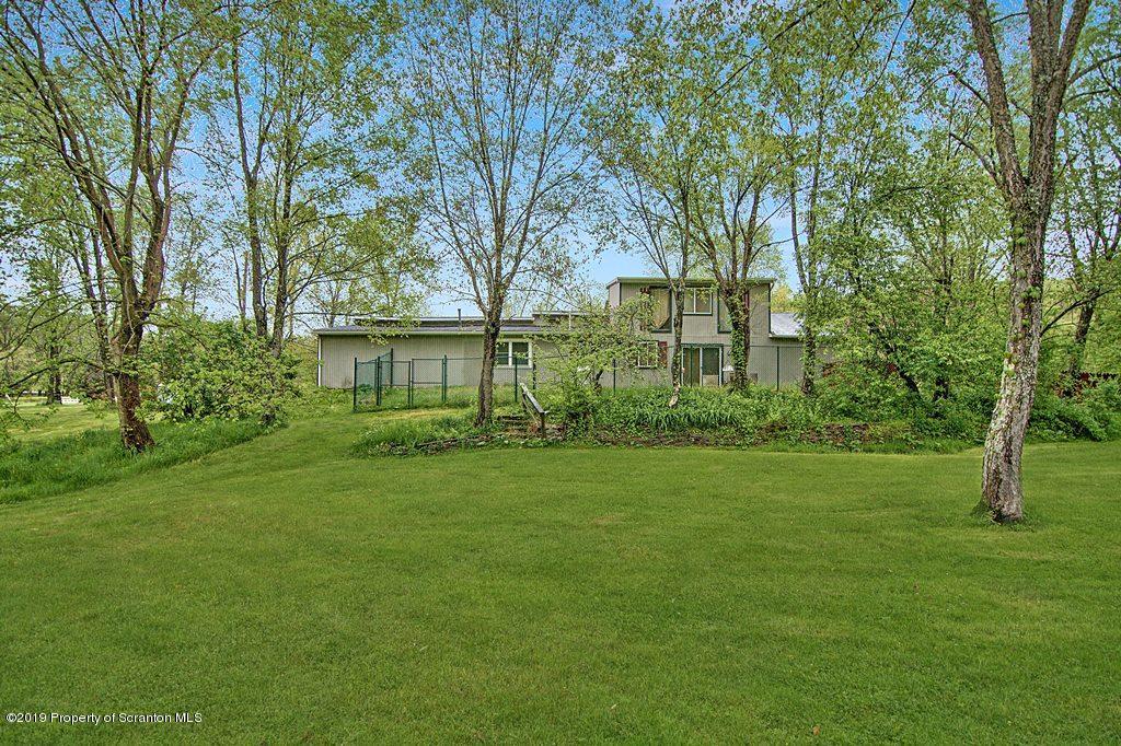 162 Highland Road Dalton, PA 18414 - Photo 5 of 44 a view of a garden