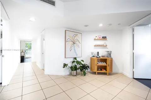 a view of livingroom with furniture and cabinet