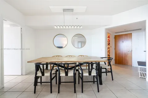 a table and chairs in a kitchen