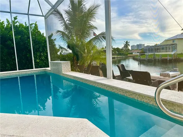 a view of a lake from a balcony