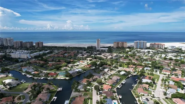 an aerial view of a building with outdoor space