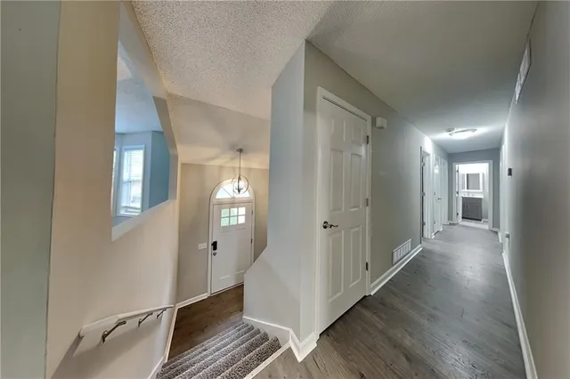 a bathroom with a toilet a sink and a bathtub