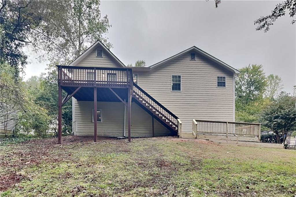 214 Brookside Drive Dallas, GA 30132 - Photo 19 of 20 a view of a house with a yard