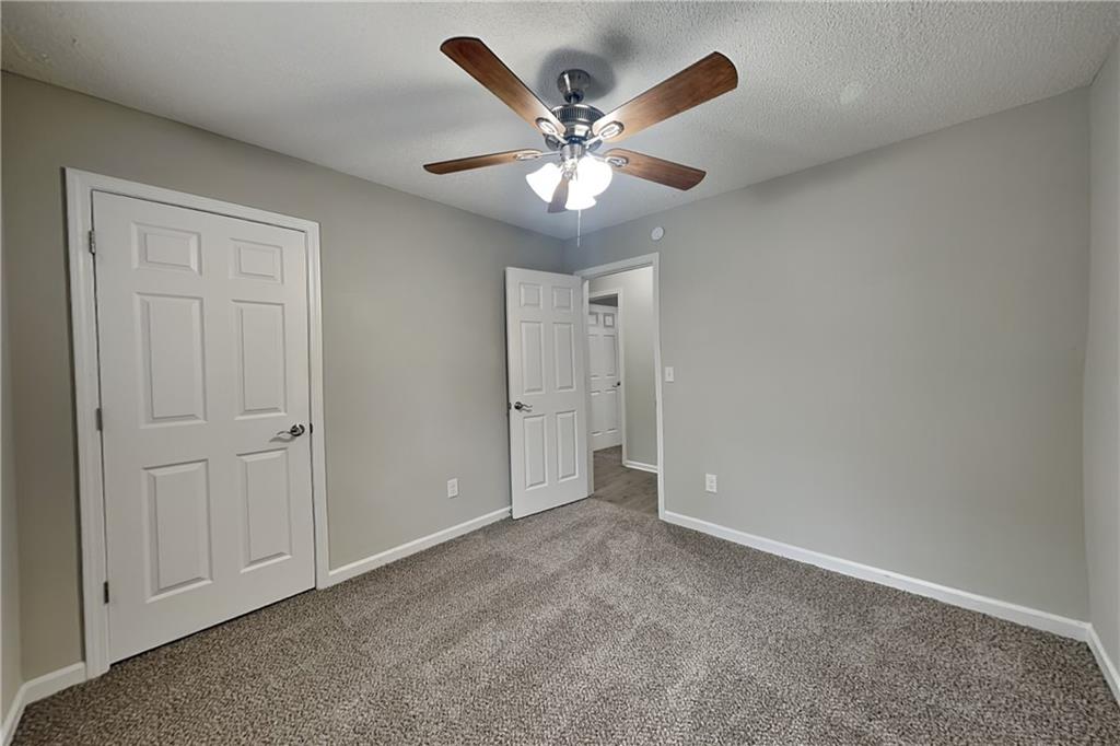 214 Brookside Drive Dallas, GA 30132 - Photo 10 of 20 a view of an empty room