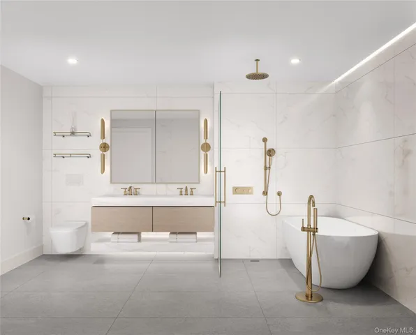 a spacious bathroom with a tub and shower