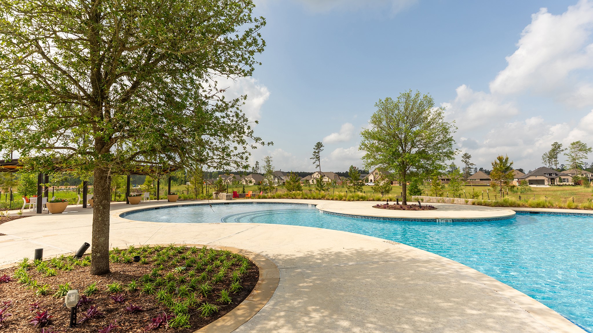 12751 Copperbush Drive Conroe, TX 77302 - Photo 10 of 14 a view of a swimming pool and outdoor space