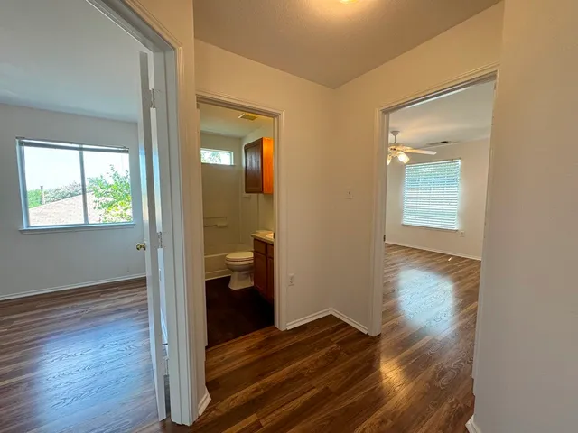 a front view of a house with a yard table and chairs