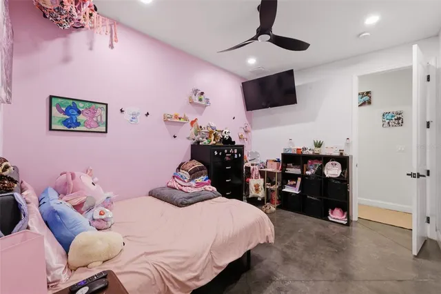 a view of a swimming pool and an outdoor seating