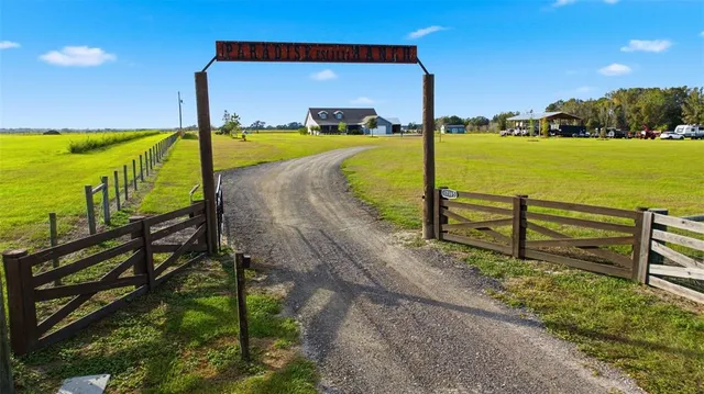 a view of a lake with a yard