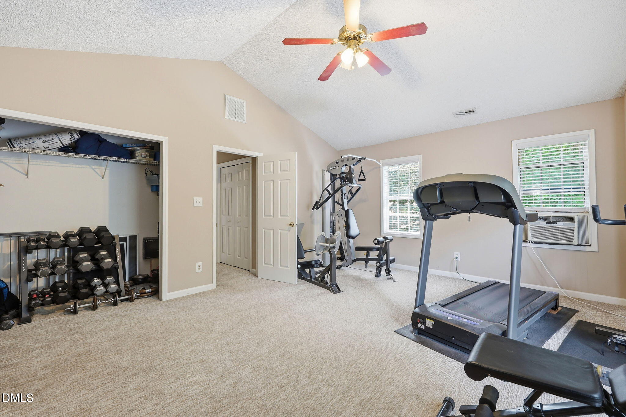 9105 Willow Valley Court Raleigh, NC 27617 - Photo 22 of 51 a view of a room with gym equipment