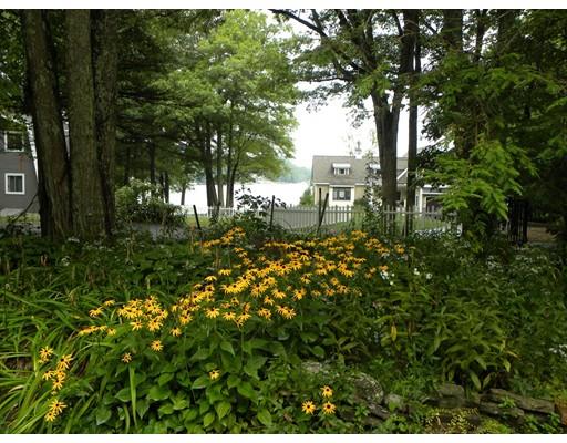 300 Partridge Hill Road Charlton, MA 01507 - Photo 2 of 39 a backyard of a house with lots of green space