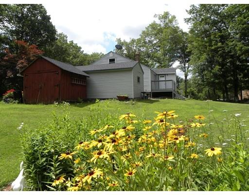 300 Partridge Hill Road Charlton, MA 01507 - Photo 21 of 39 a backyard of a house with lots of green space