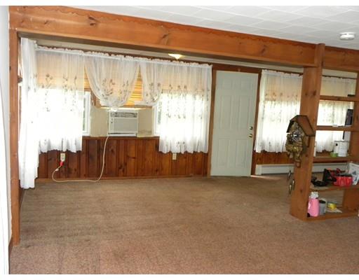 300 Partridge Hill Road Charlton, MA 01507 - Photo 3 of 39 a view of a room with furniture and window